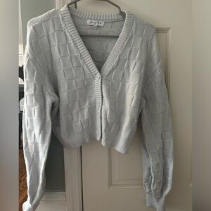 Emory Park - Cropped 3 Button light blue cardigan, checkered textured pattern.